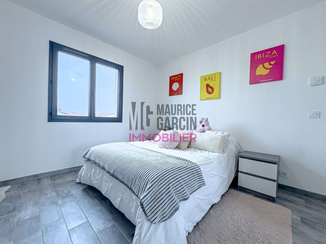 Maison à LAUDUN-L'ARDOISE