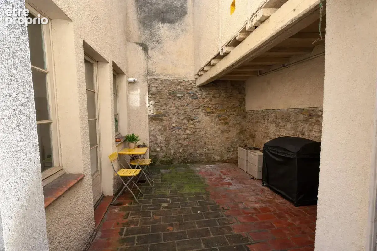 Maison de caractère à vendre dans la Bastide de Carcassonne avec patio, toit terrasse et 4 chambres - photo 4