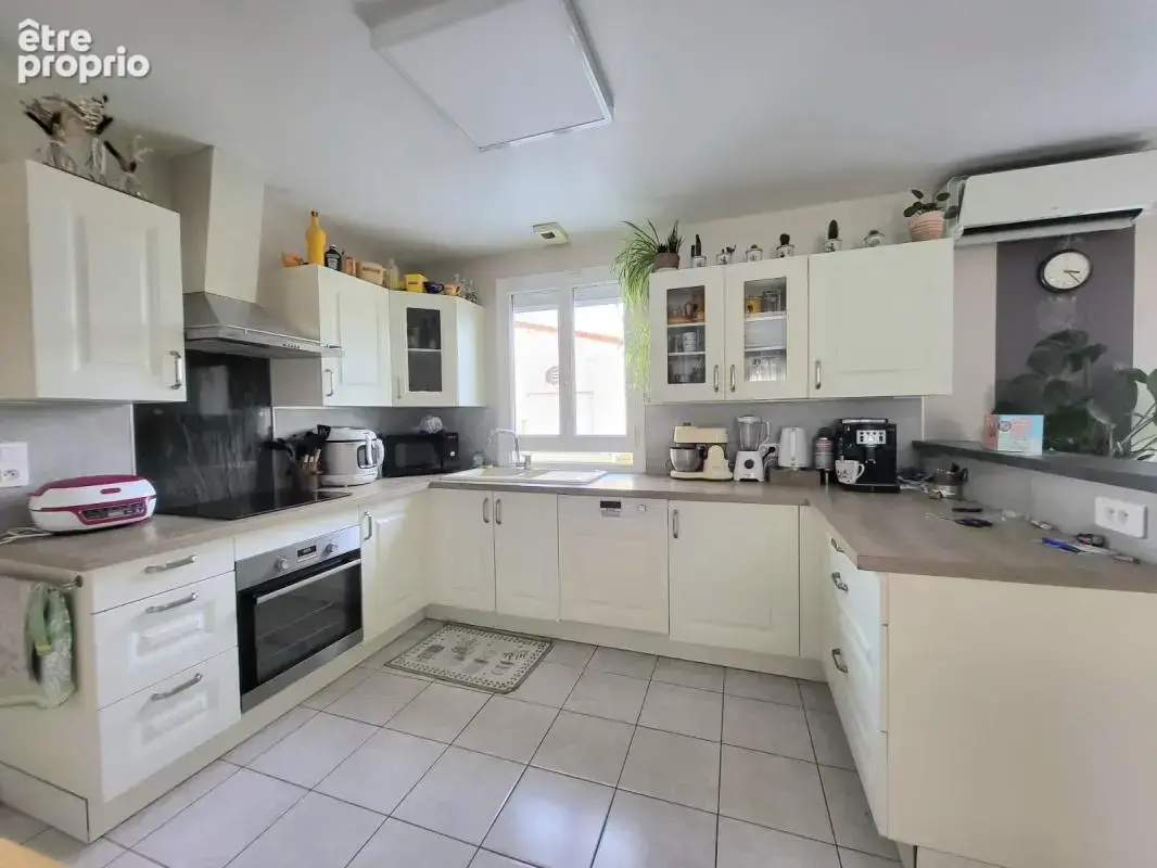 Maison plain-pied, 4 chambres, garage et jardin - photo 9