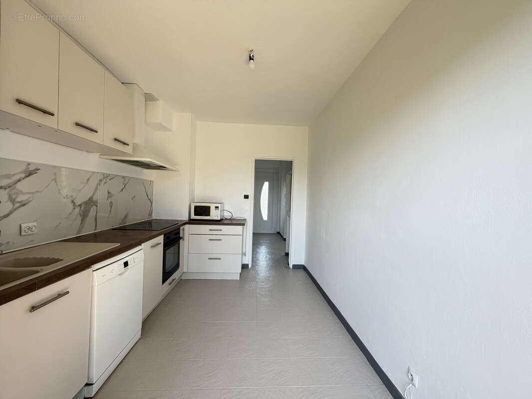 MAISON T5 de 157 M2 avec garage de 30 M2 et jardin de 650 M2 - photo 5