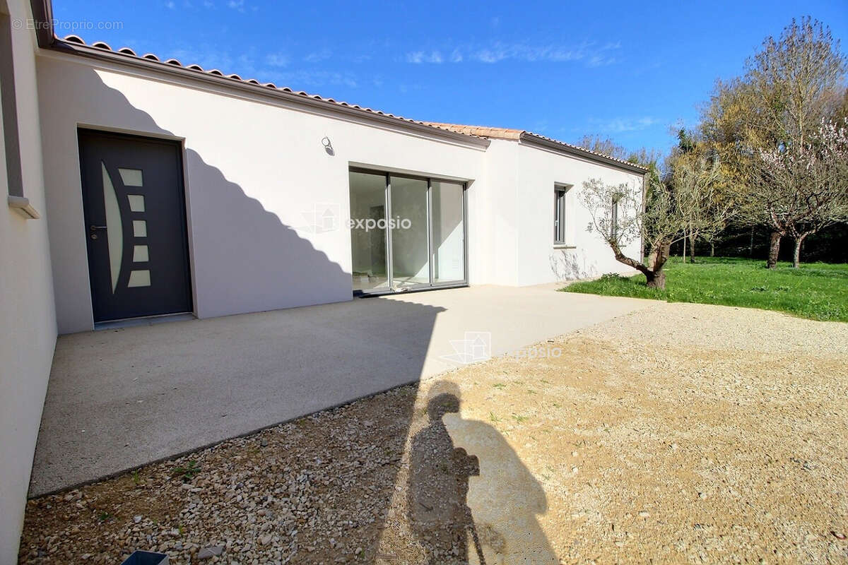 Maison neuve de plain-pied .117 m² .4 chambres . Garage . Terrain 816 m² - photo 11