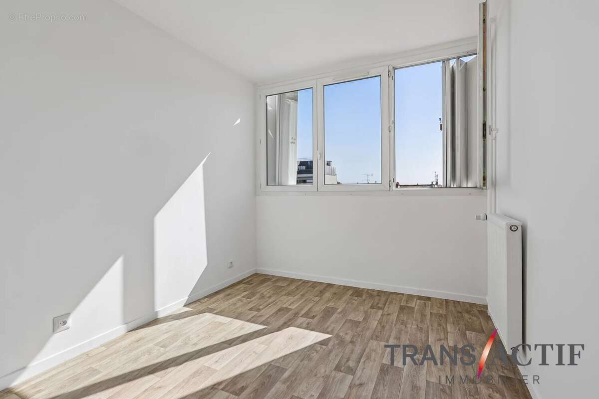À vendre – Superbe 4 pièces de 77 m² avec balcon, box et cave - photo 7
