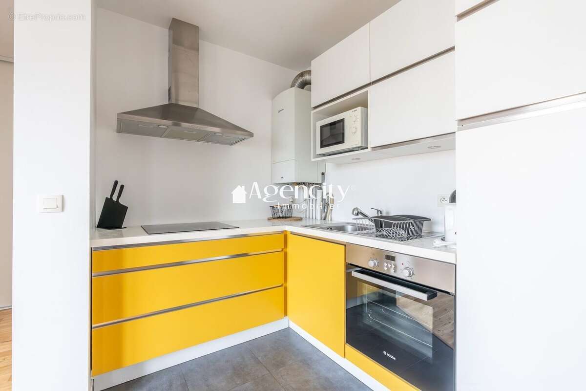 Cuisine américaine équipée - Appartement à SERRIS