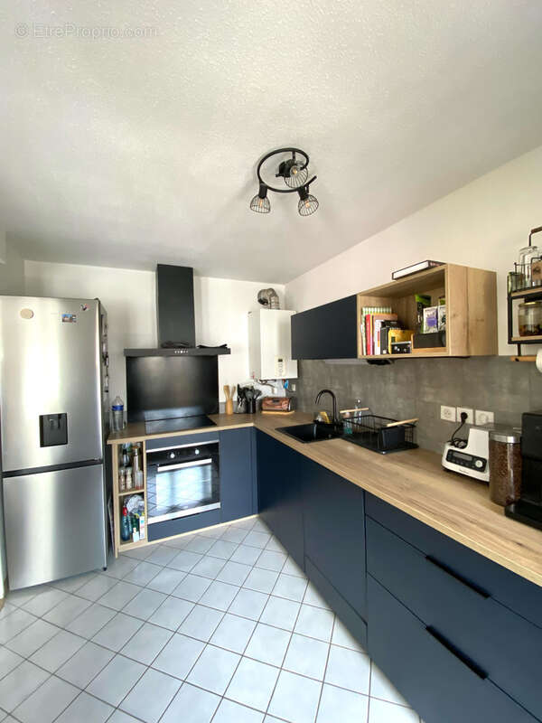 SOUS COMPROMIS : Centre-ville : T3 de 72 m2 avec terrasse et parking privatif - photo 5
