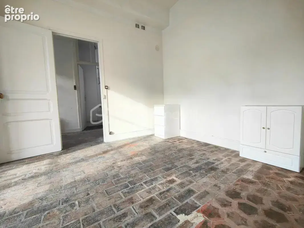 Ensemble immobilier (local commercial + appartement) plein centre ville - photo 4