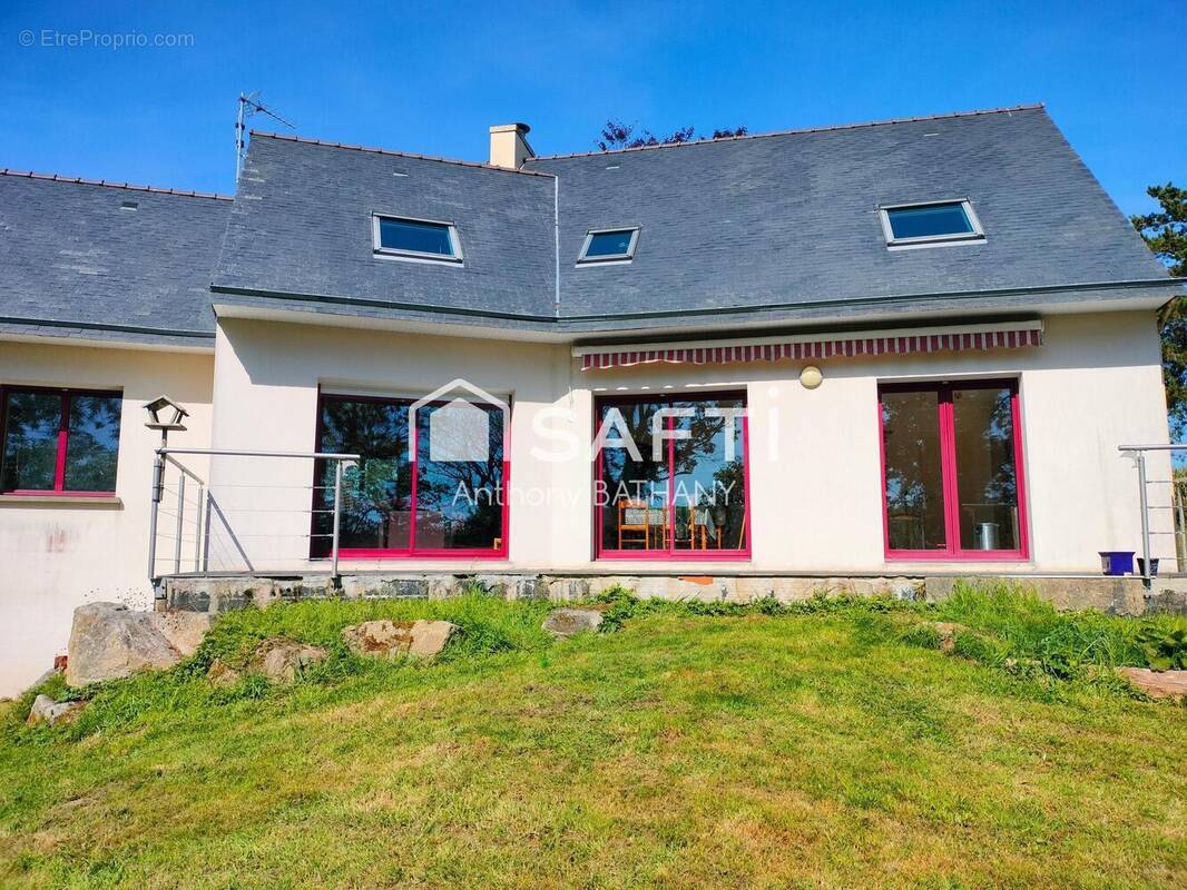 Photo 1 - Maison à PLUGUFFAN