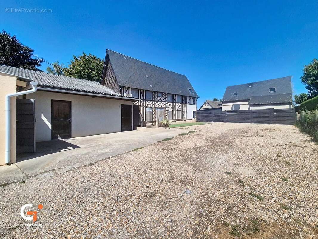 Investissement locatif – ensemble de murs commerciaux loués – amfreville-saint-amand - photo 4