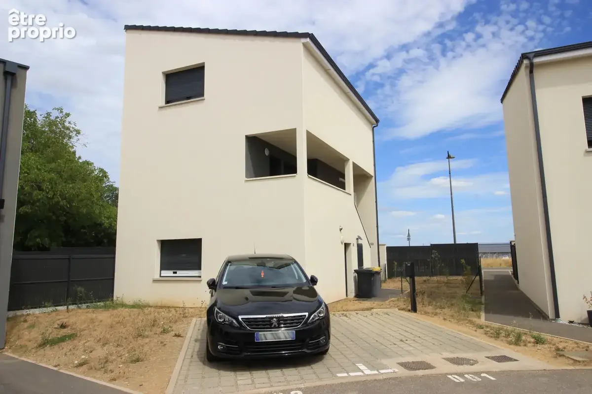 POUILLY   Duplex récent 68 m2 avec terrasse, jardin et parking - photo 11