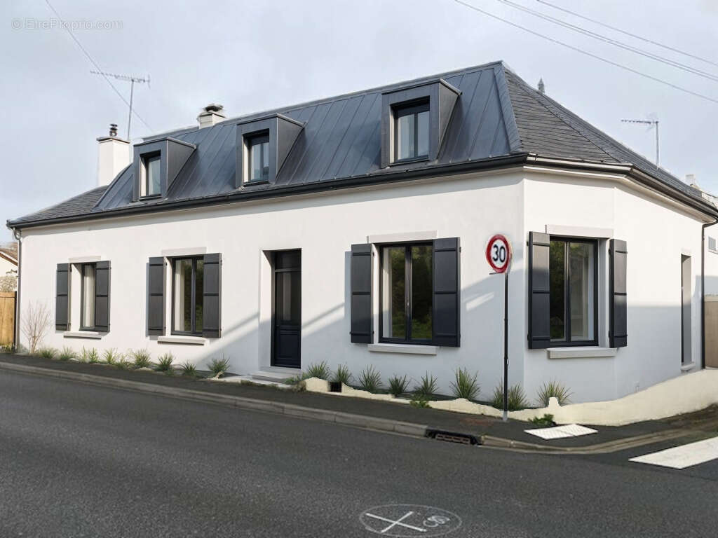 Maison à PARIGNE-L'EVEQUE