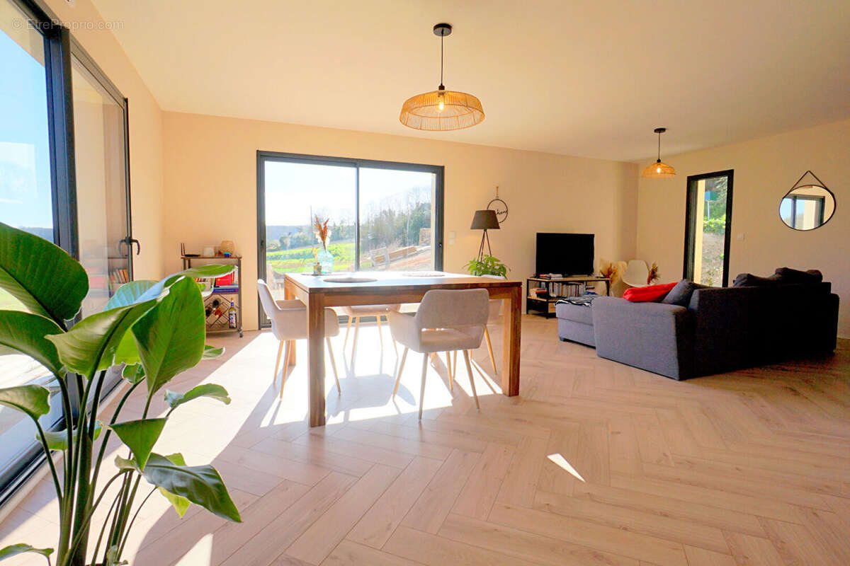 Maison à AUBERGENVILLE