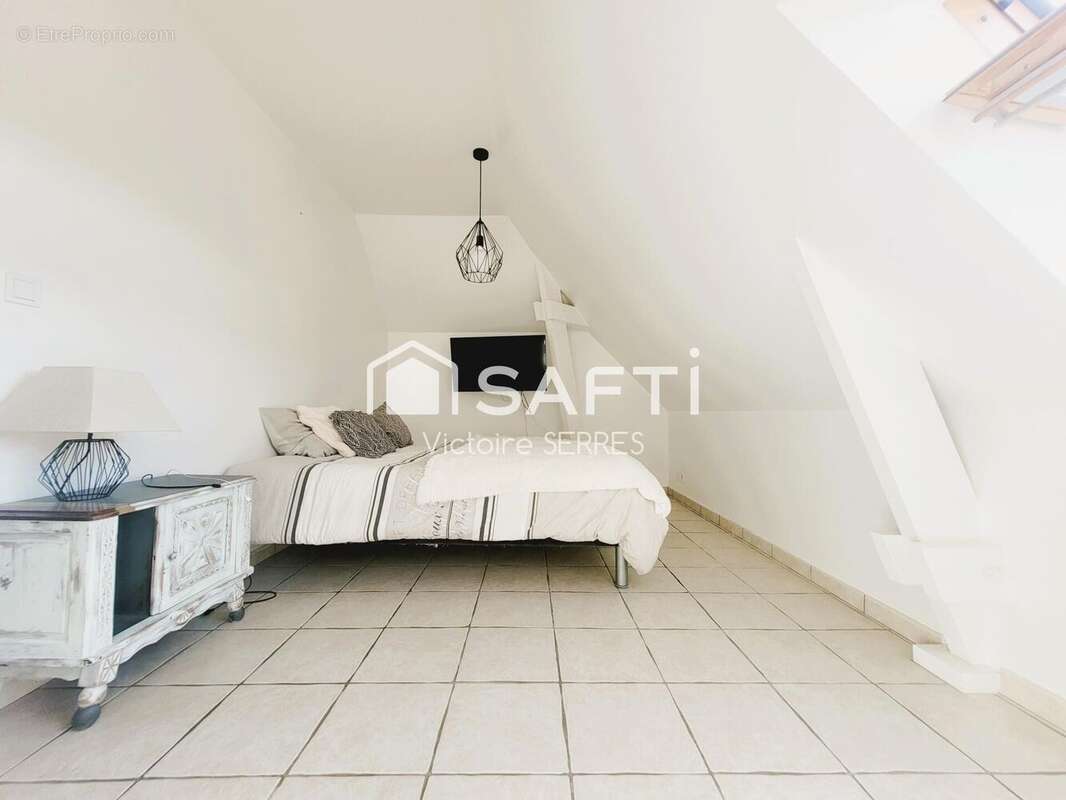 Photo 8 - Appartement à HEROUVILLE-SAINT-CLAIR