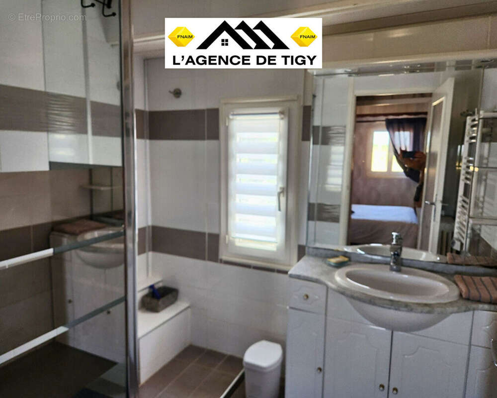 A vendre une charmante maison - photo 9