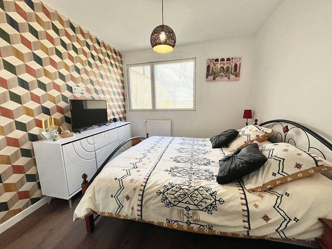 Appartement à VAULX-MILIEU