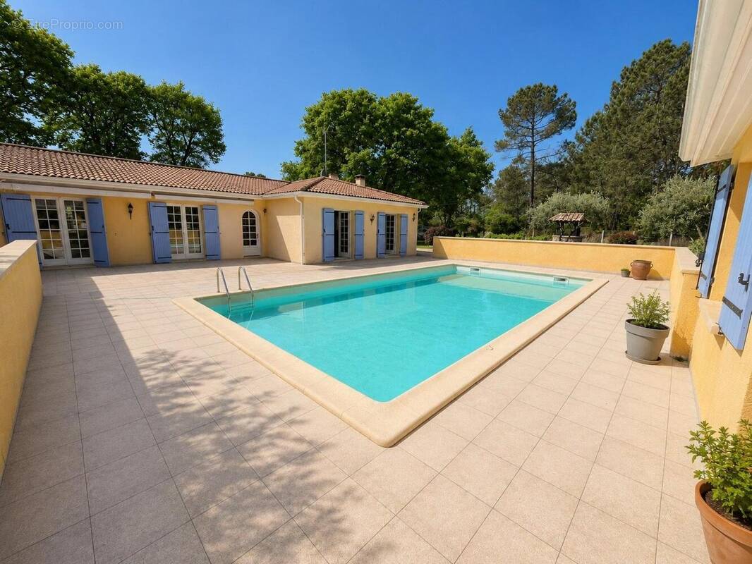 Photo 1 - Maison à ROAILLAN