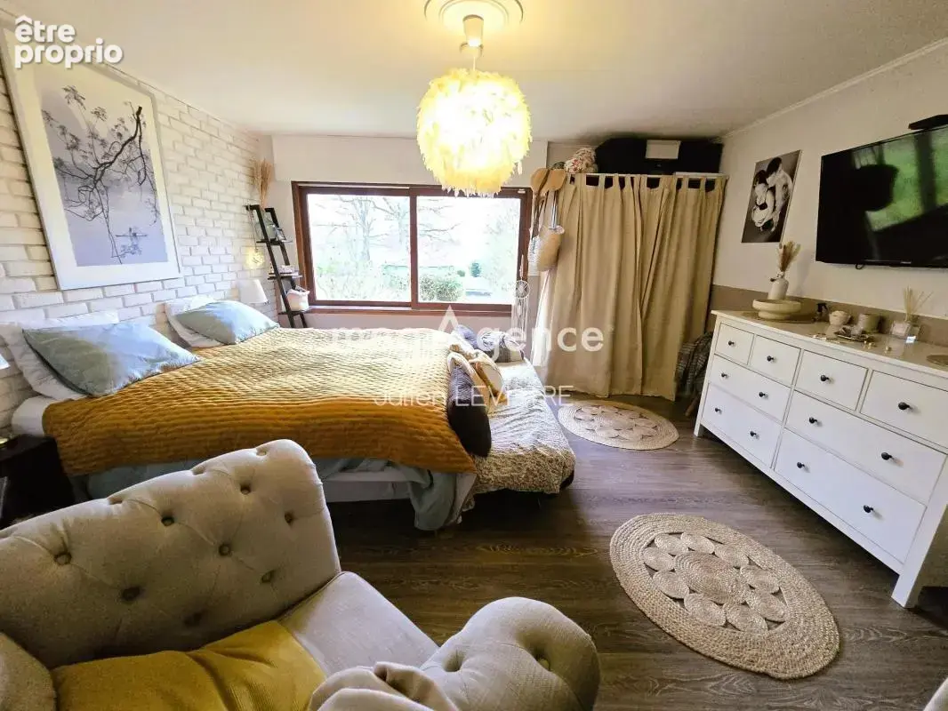 Maison de 7 pièces de 165m² - photo 7