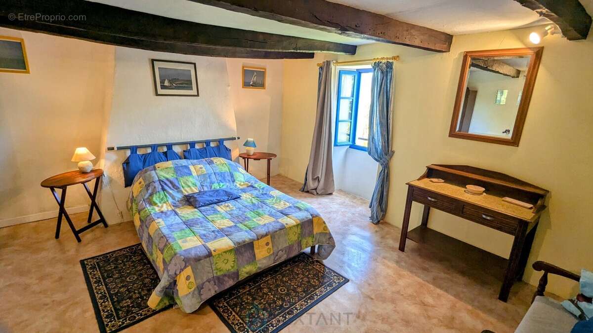 À 8 kilometres de Baud  Maison en pierres, début XXe siècle, face au Blavet - photo 14