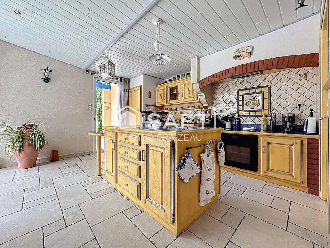 Photo 3 - Maison à LA CHAPELLE-SAINT-LAURENT