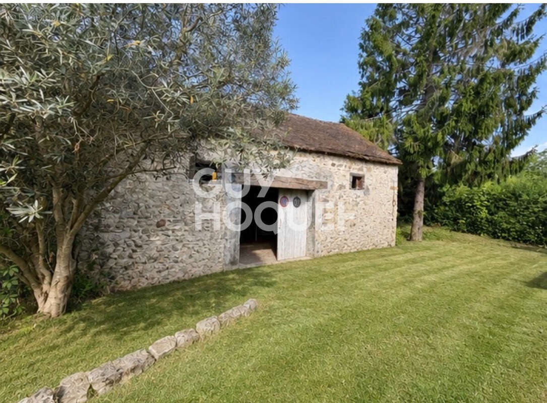 Maison  4 pièces de  130 m2 sur un terrain de 1168m²  avec une grange - photo 8