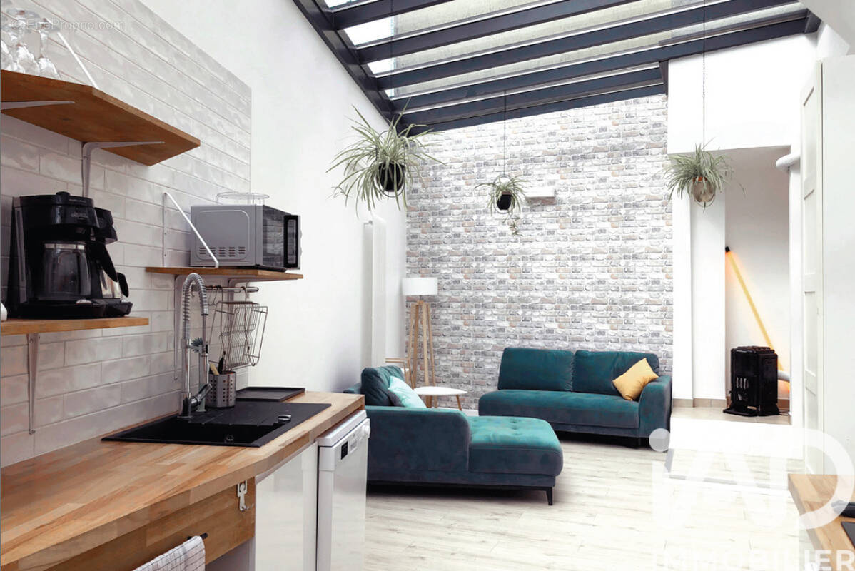 Photo 1 - Maison à LA COURNEUVE