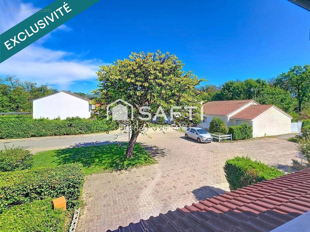 Photo 1 - Maison à MEYZIEU