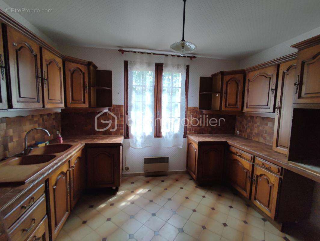 Maison de 113 m² sur sous sol et grenier aménageable sur 445 m² de parcelle - photo 4
