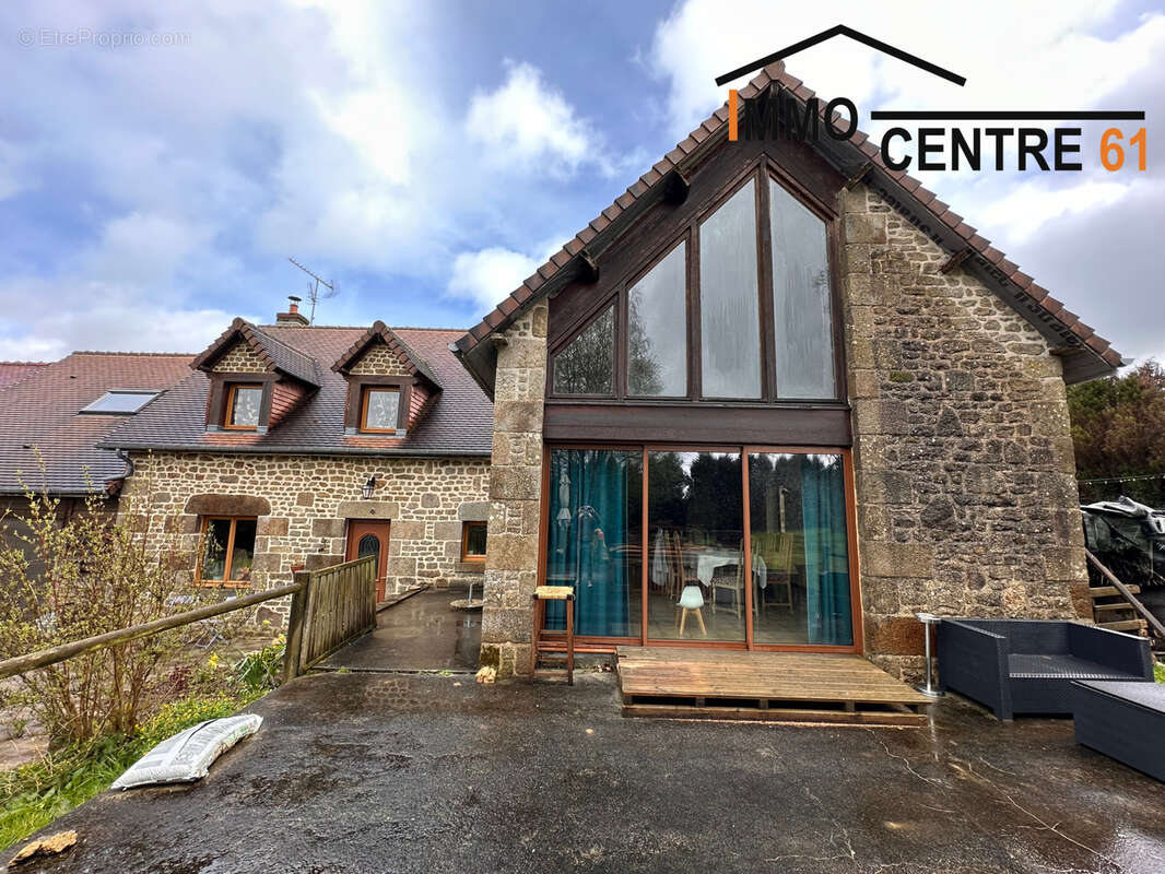 Maison d'architecte 5 chambres et un gîte de 64m2 sur un terrain de 5527m2 arboré. - photo 5
