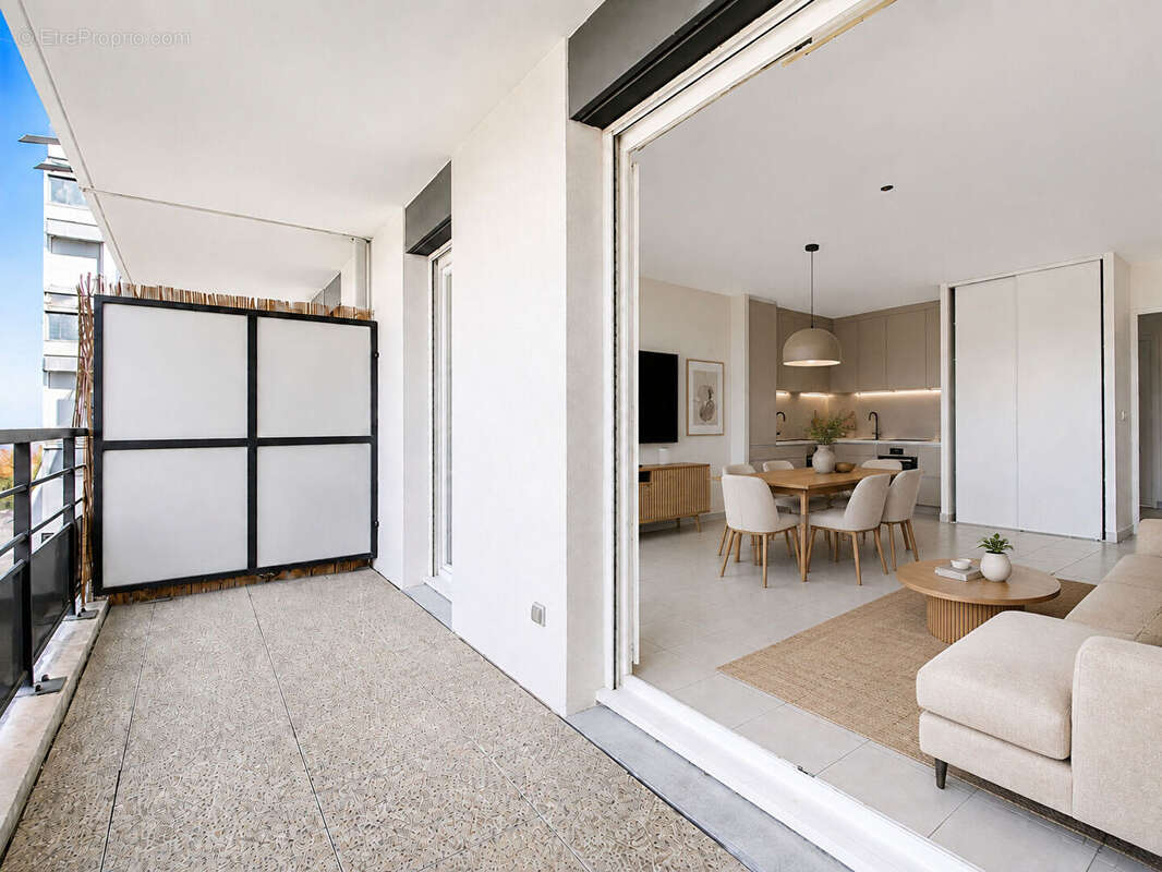 Appartement  avec terrasse en hyper-Centre de Meyzieu. - photo 4