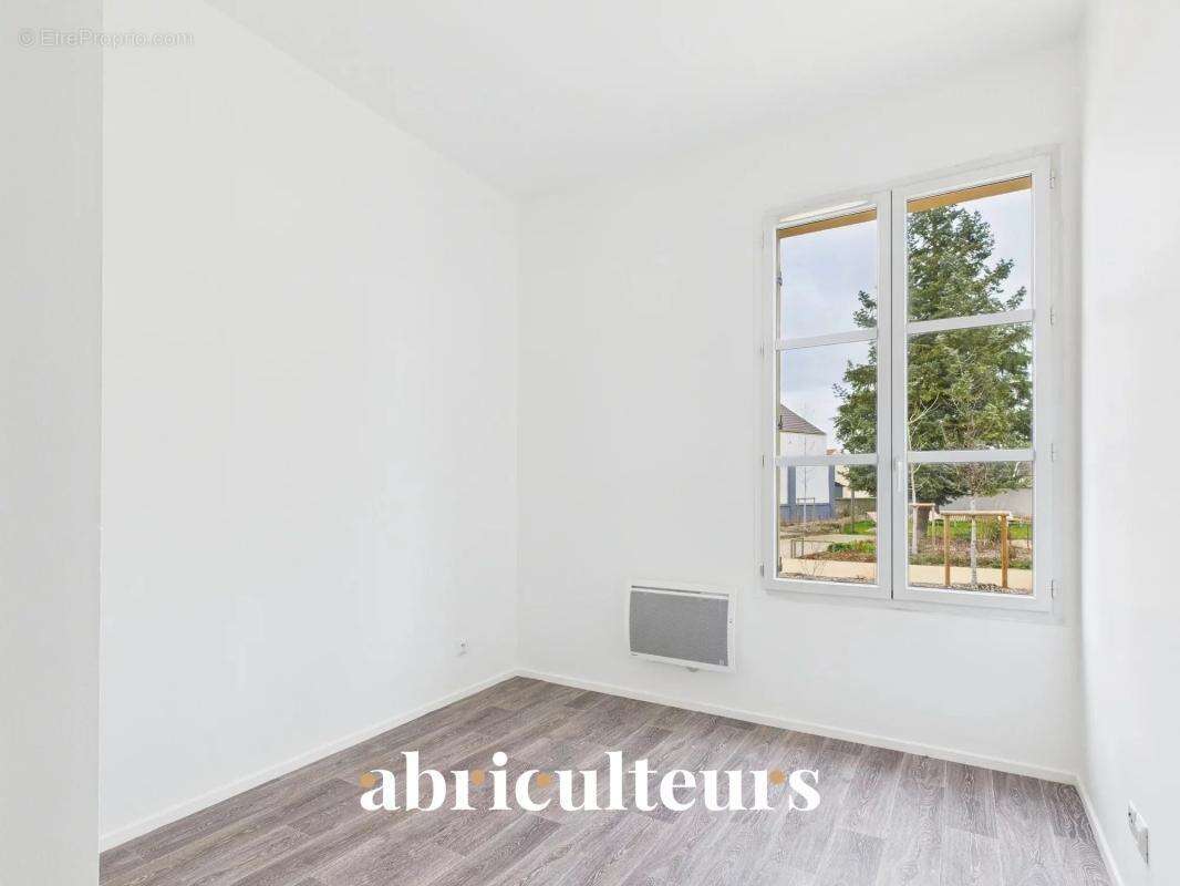Appartement T3 en rez-de-jardin avec terrasse et vue sur les jardins intérieurs – Résidence de standing à Survilliers - photo 8