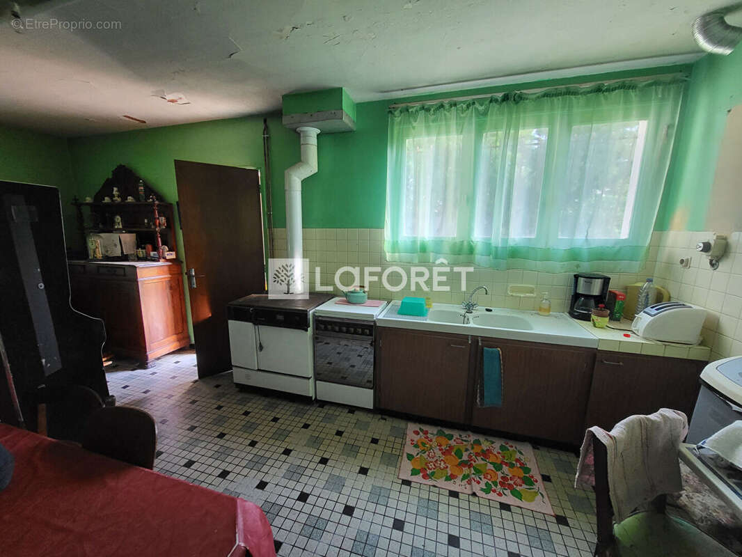 Maison pleine de potentiel au coeur d'un quartier paisible - photo 3