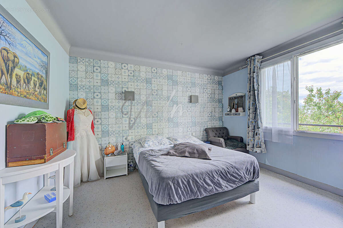 Maison spacieuse 8 pièces à vendre à Poissy - La Maladrerie - photo 8