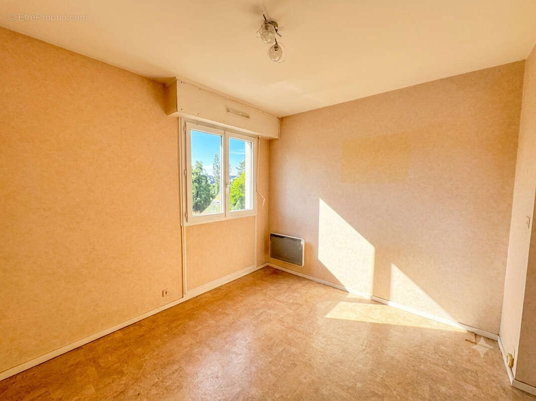 Appartement Vannes 4 pièce(s) 69 m2 1 parking + 1 garage + 1 cave . - photo 6