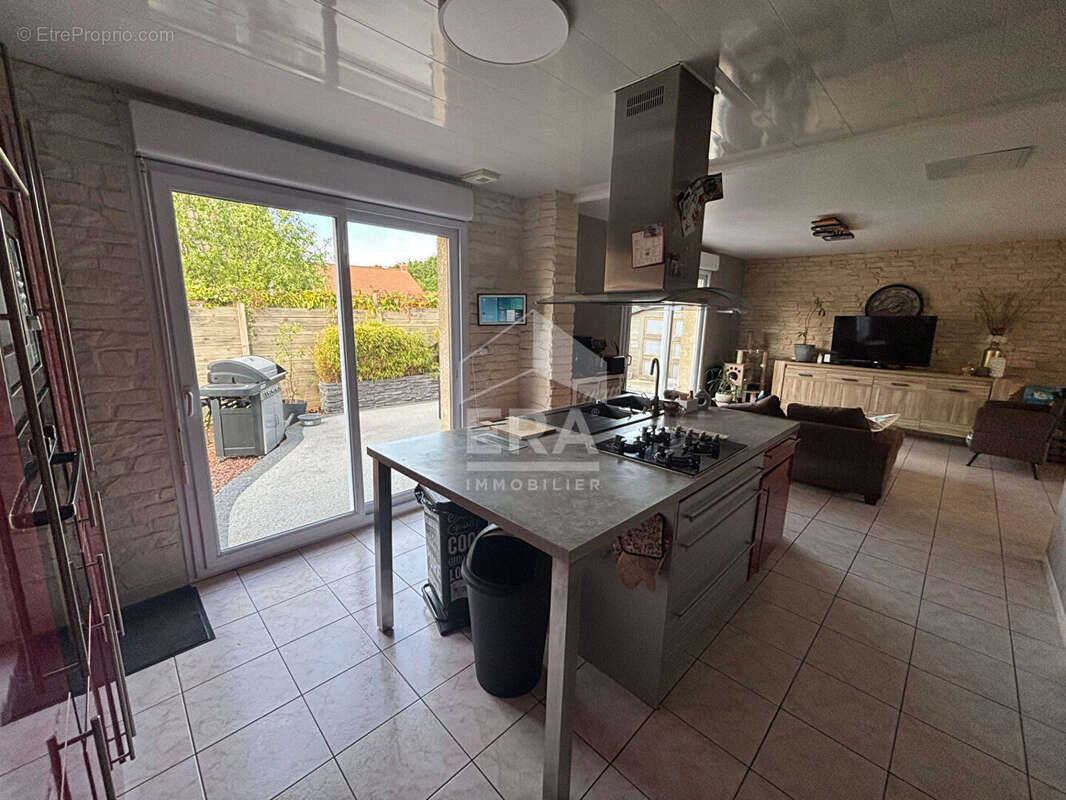 Maison à COURRIERES