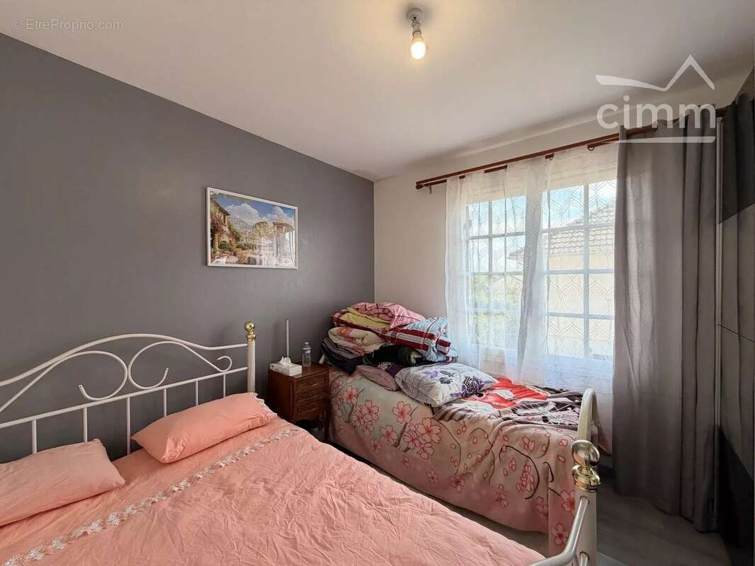 MER – Maison sur sous-sol complet de 130 m² – 4 chambres – Terrain de 970 m² avec vue dégagée sur les champs - photo 9
