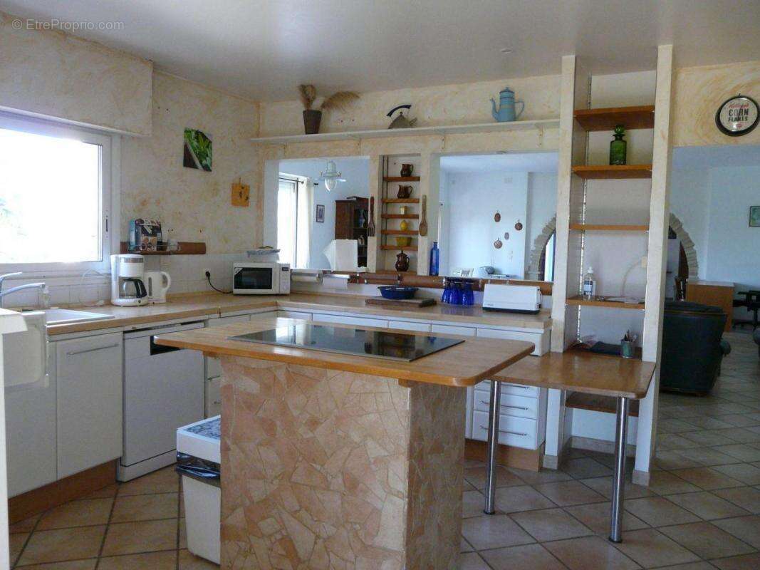 Maison à CASTELNAU-MONTRATIER