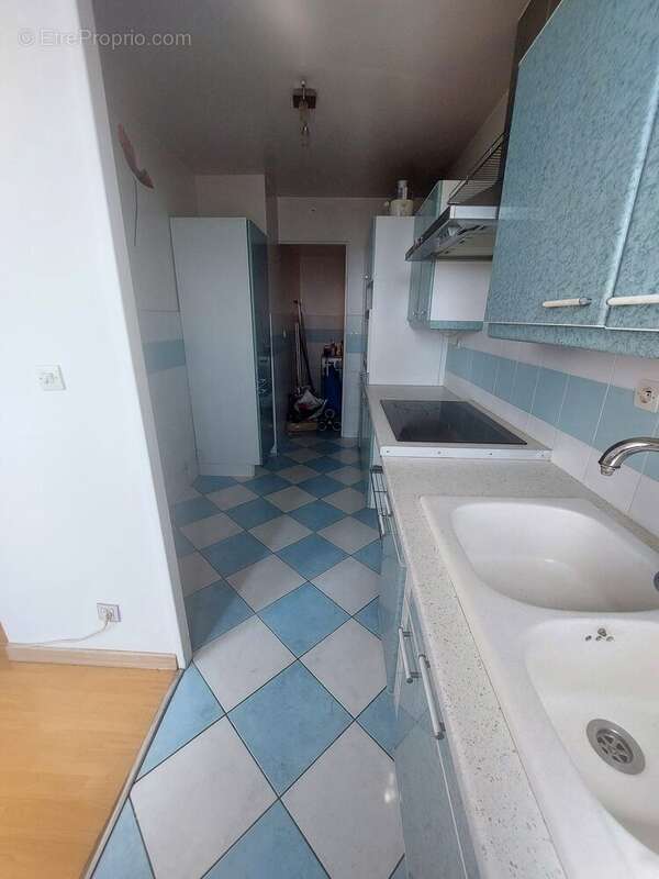 Cuisine et buanderie - Appartement à SARTROUVILLE