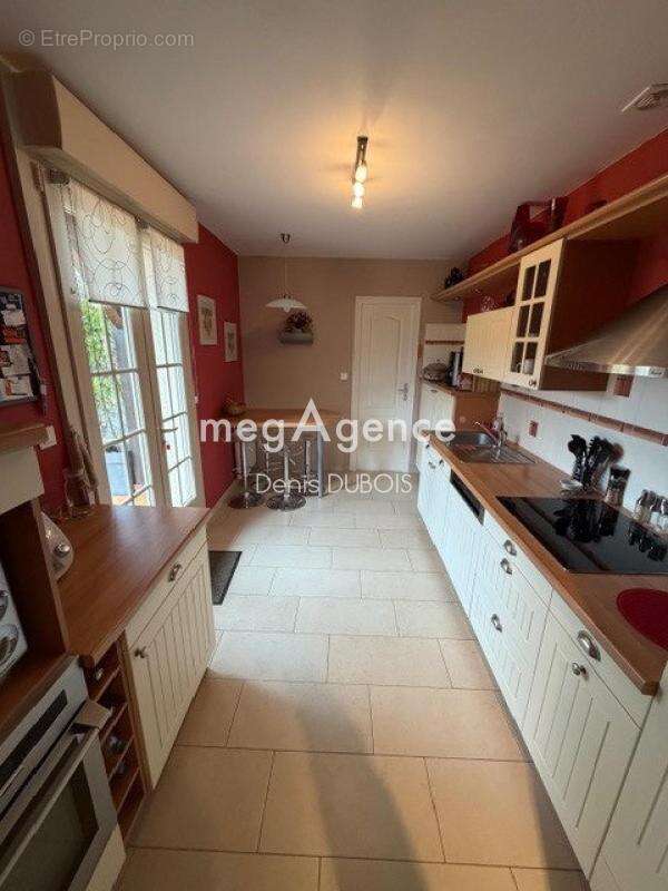 Maison à CONDE-SUR-SARTHE