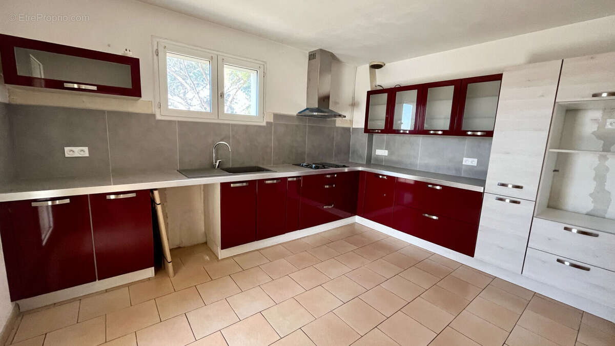 Appartement T3 de 95 m2 avec deux garages et un jardinet - photo 2