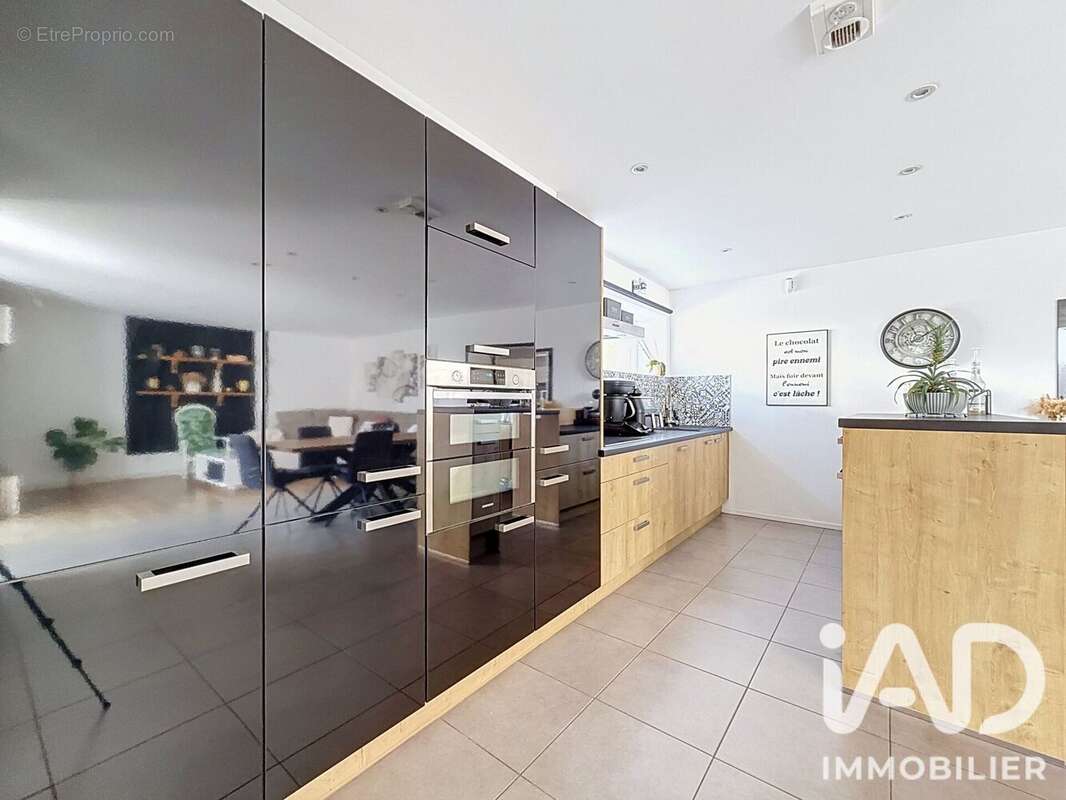 Maison 129 m² à Coueron  - photo 7