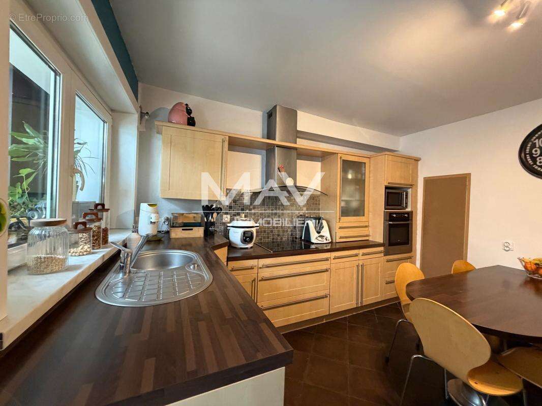 Maison 5 pièces 130 m² à vendre à Tourcoing (59200) - photo 2
