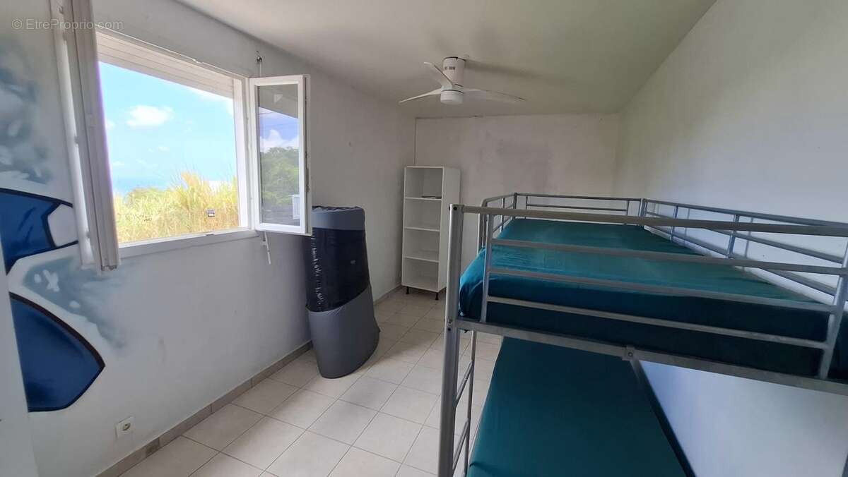 A VENDRE : Villa 2 T2 et 1 T4 (Vieux Habitants - 97119) - photo 30