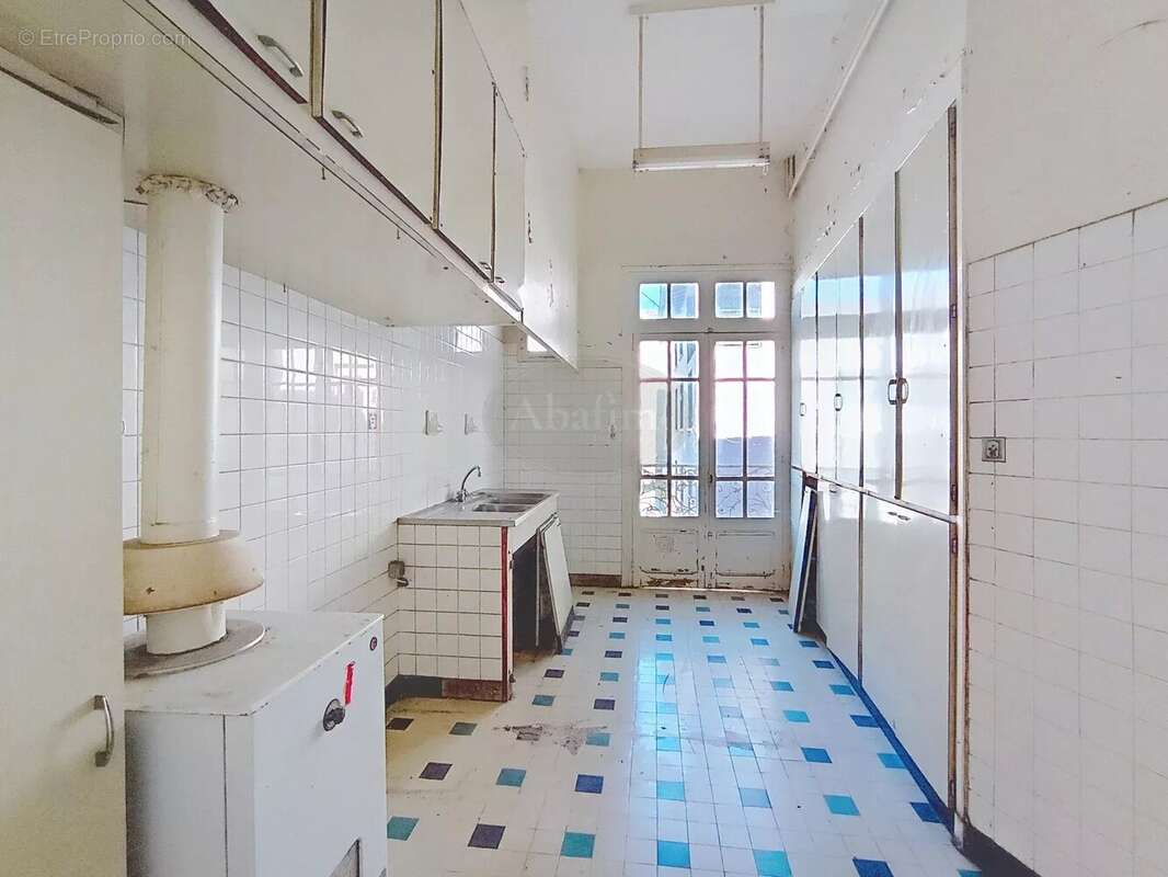Appartement et local commercial - photo 5