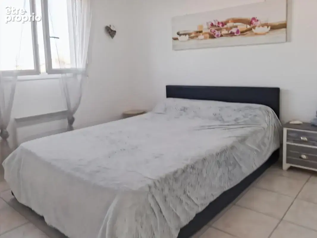 Vente maison à Marseillan avec jardinet, garage et parking en résidence sécurisée - photo 6