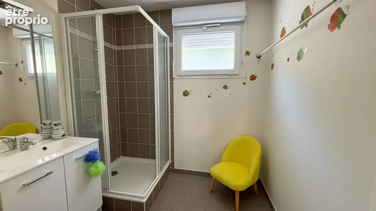 Appartement 3 pièces à vendre à Besançon - Rez-de-chaussée avec terrasse et garage - photo 2