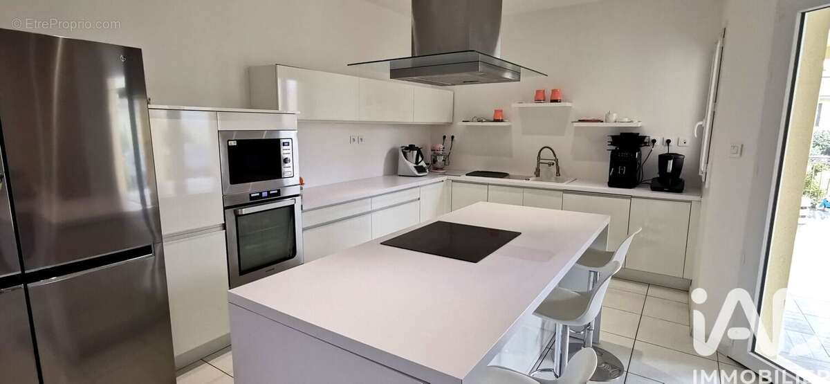 Photo 3 - Maison à TERRASSON-LAVILLEDIEU