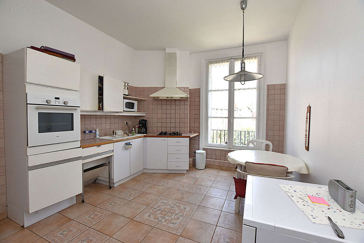 Appartement Le Puy En Velay 5 pièce(s) 207 m² + grand garage - photo 5