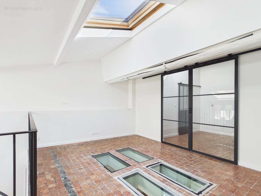 Duplex au charme historique de 102 m² - photo 12