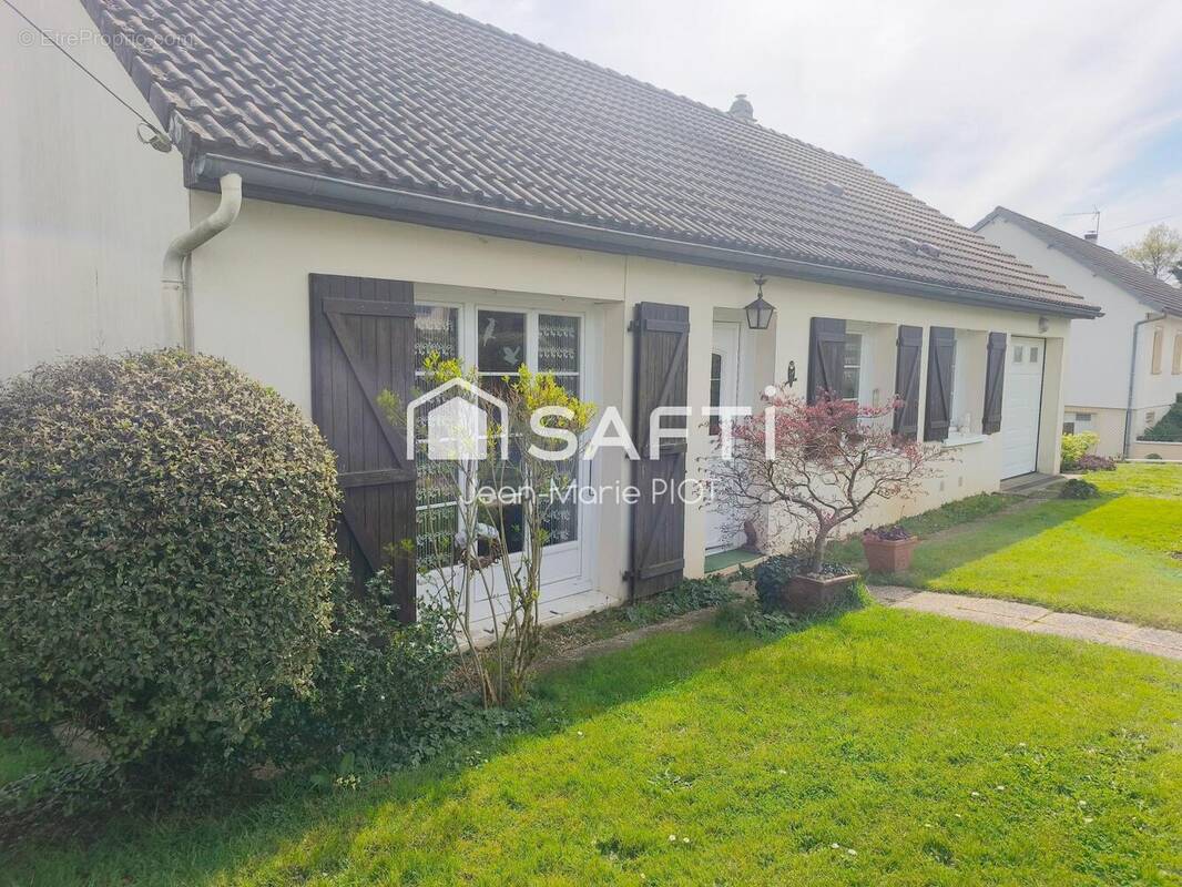 Photo 1 - Maison à LA MADELEINE-BOUVET
