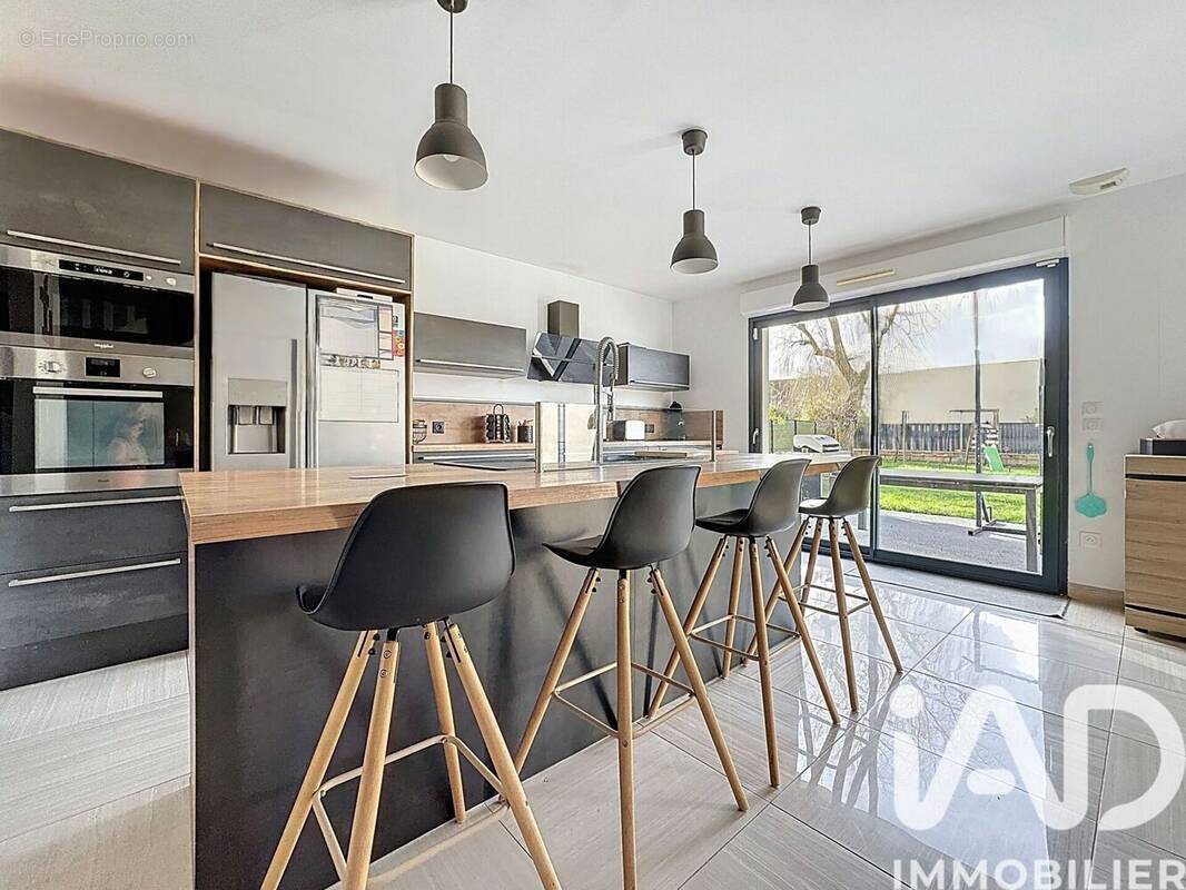 Photo 1 - Maison à GUIGNES