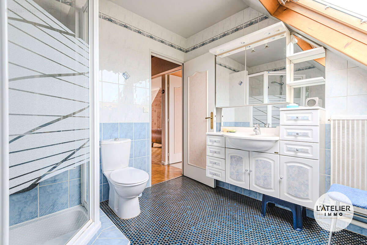 Maison familiale de 101 m² avec jardin et sous-sol complet - photo 9