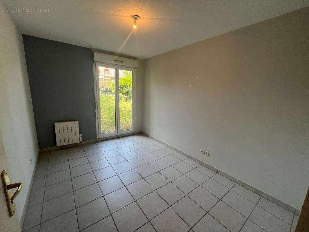 Appartement T4 de 86 m² en rez-de-jardin – Centre de Pont-de-Chéruy - photo 13